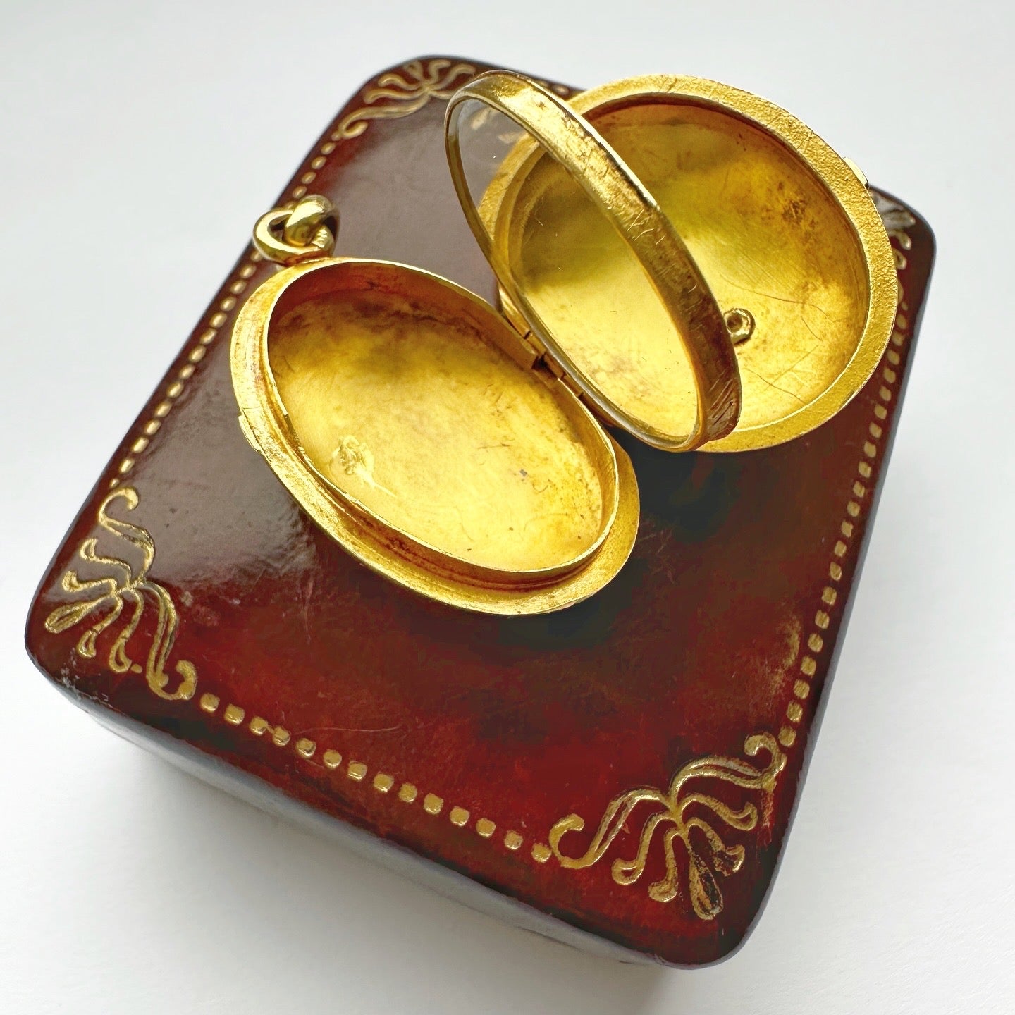 Antique 18ct gold, ruby & seed pearl locket