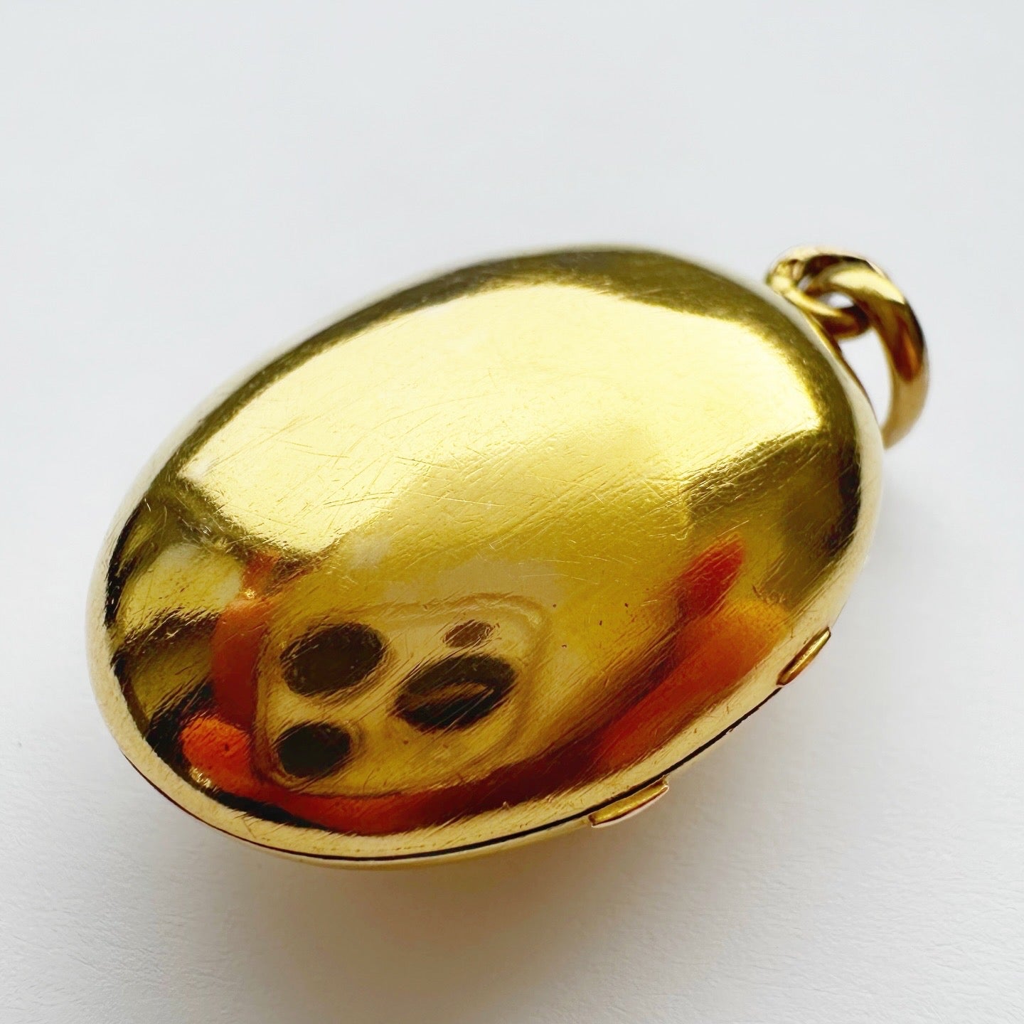 Antique 18ct gold, ruby & seed pearl locket
