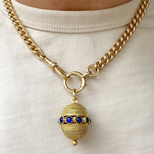 Vintage 18ct gold orb pendant