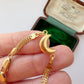 Vintage 18ct gold moon station bracelet