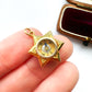 Antique 18ct gold star compass charm