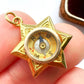Antique 18ct gold star compass charm