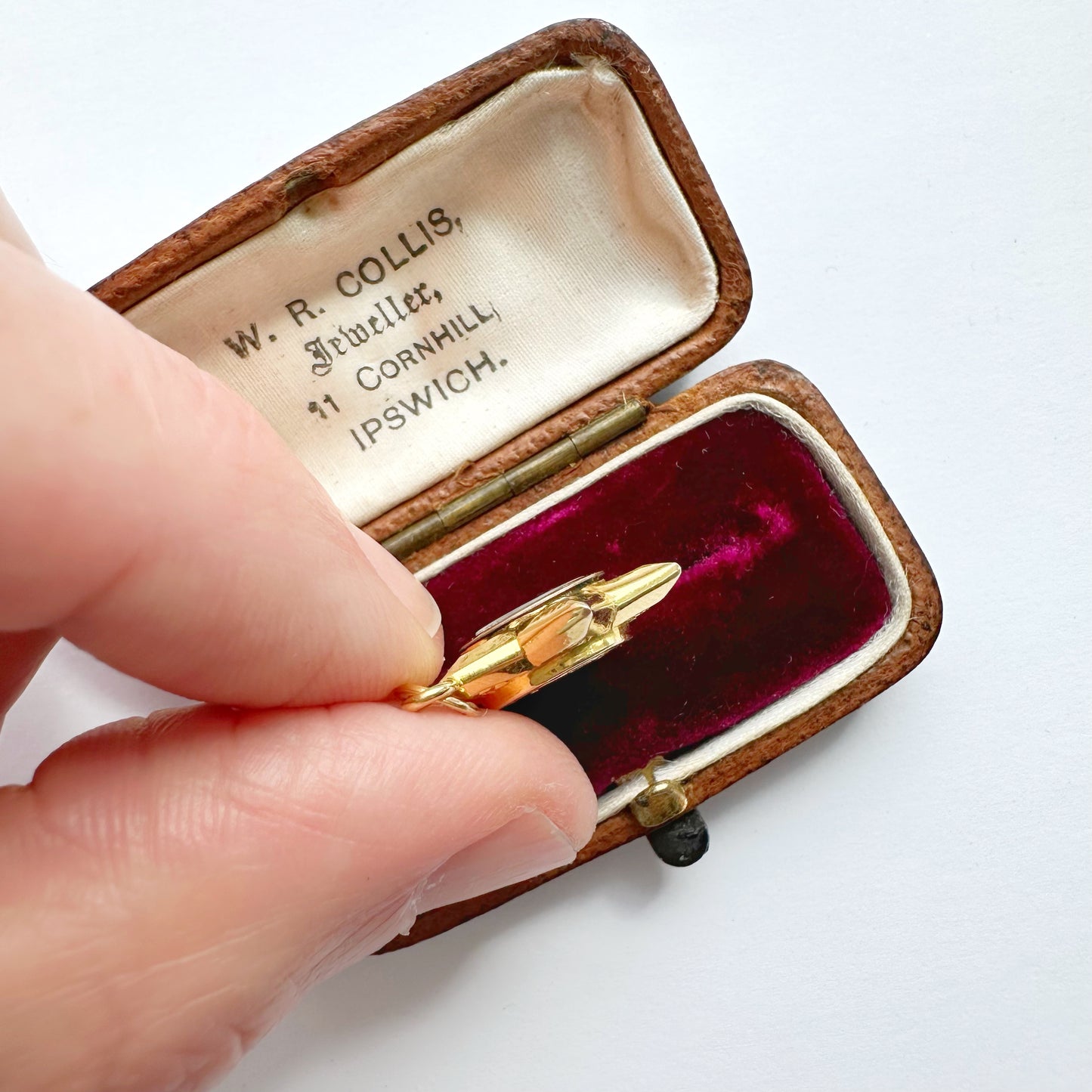 Antique 18ct gold star compass charm