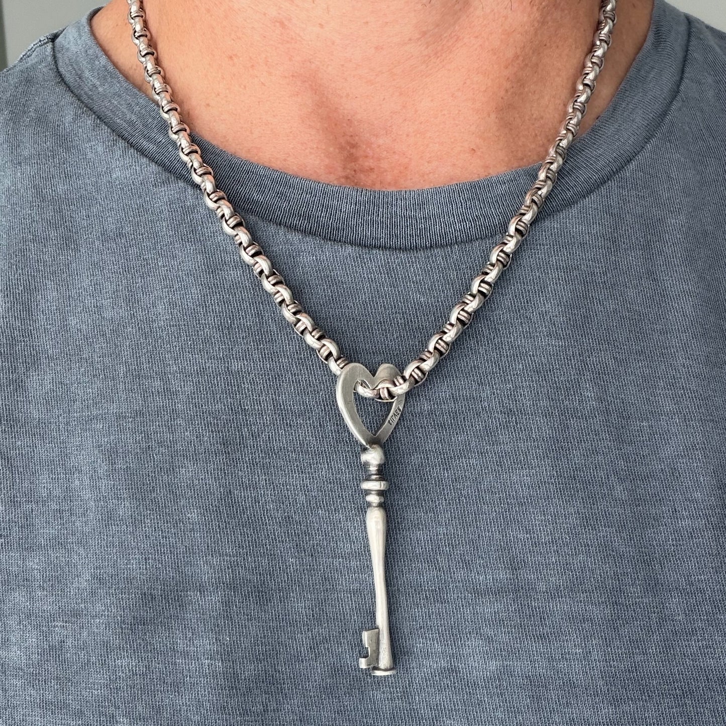 Vintage silver heart key pendant