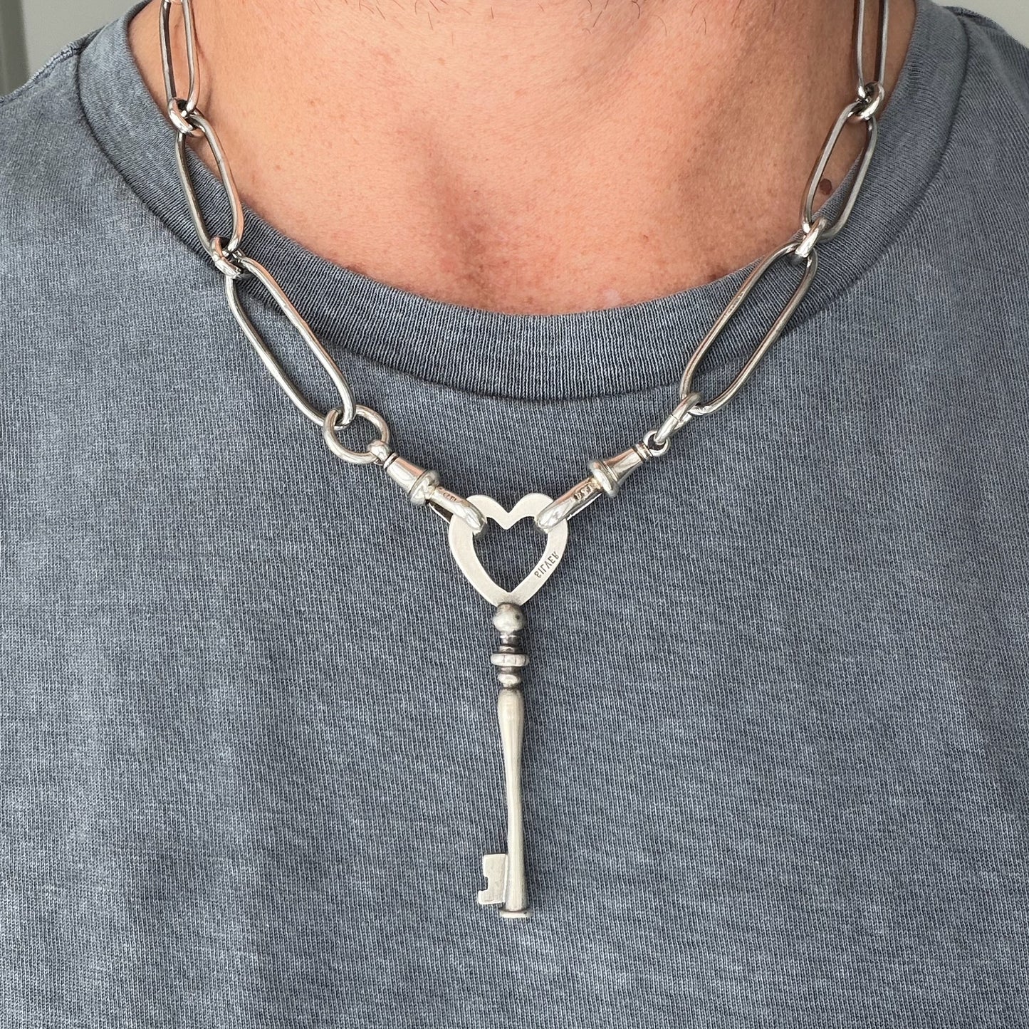 Vintage silver heart key pendant
