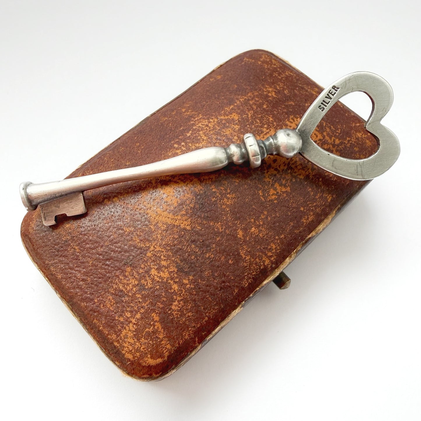 Vintage silver heart key pendant