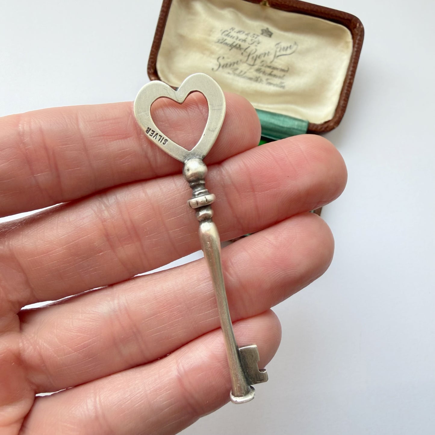 Vintage silver heart key pendant