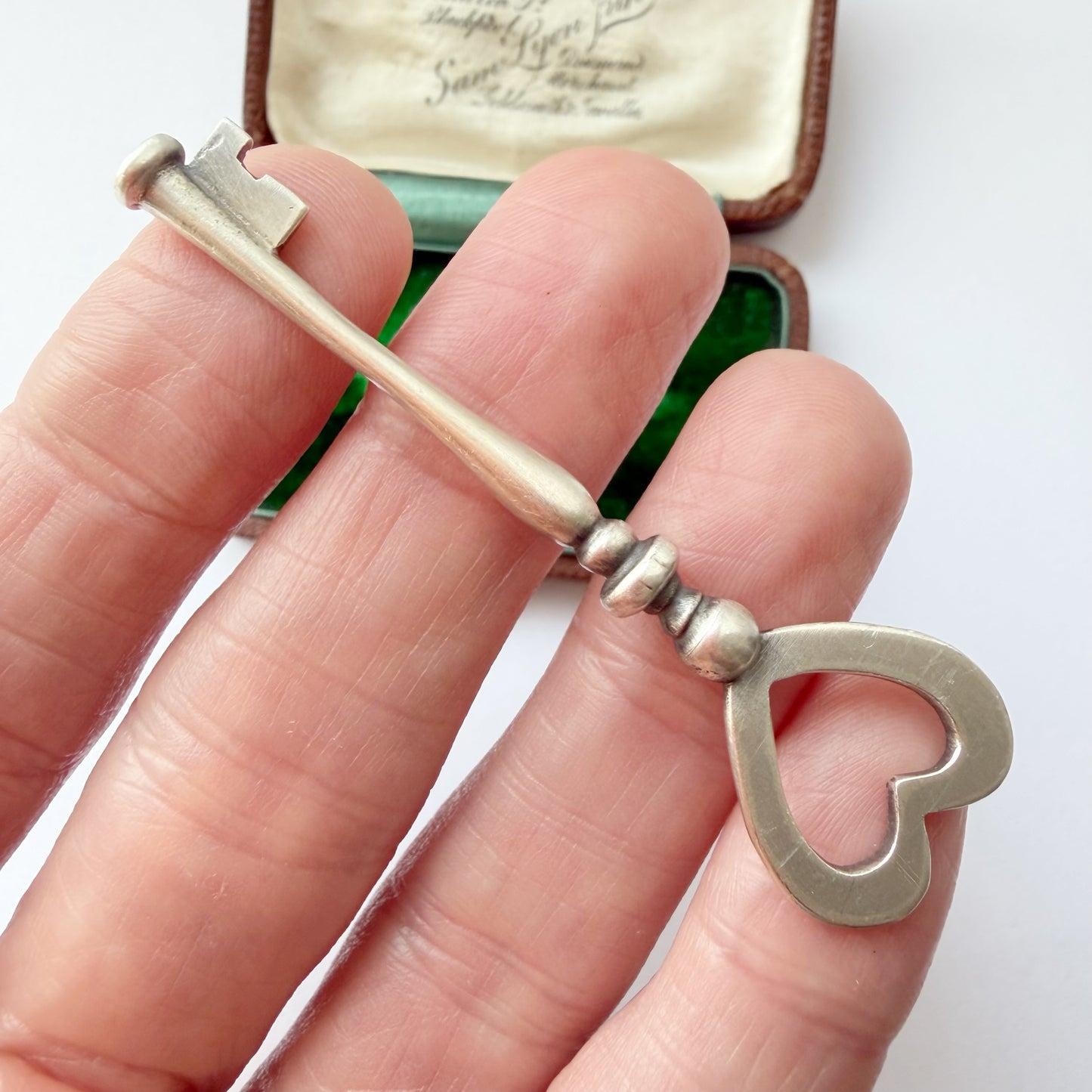 Vintage silver heart key pendant