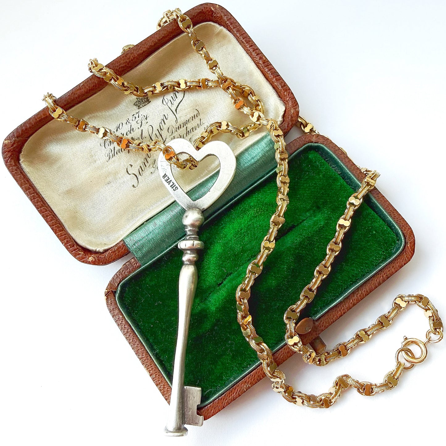 Vintage silver heart key pendant