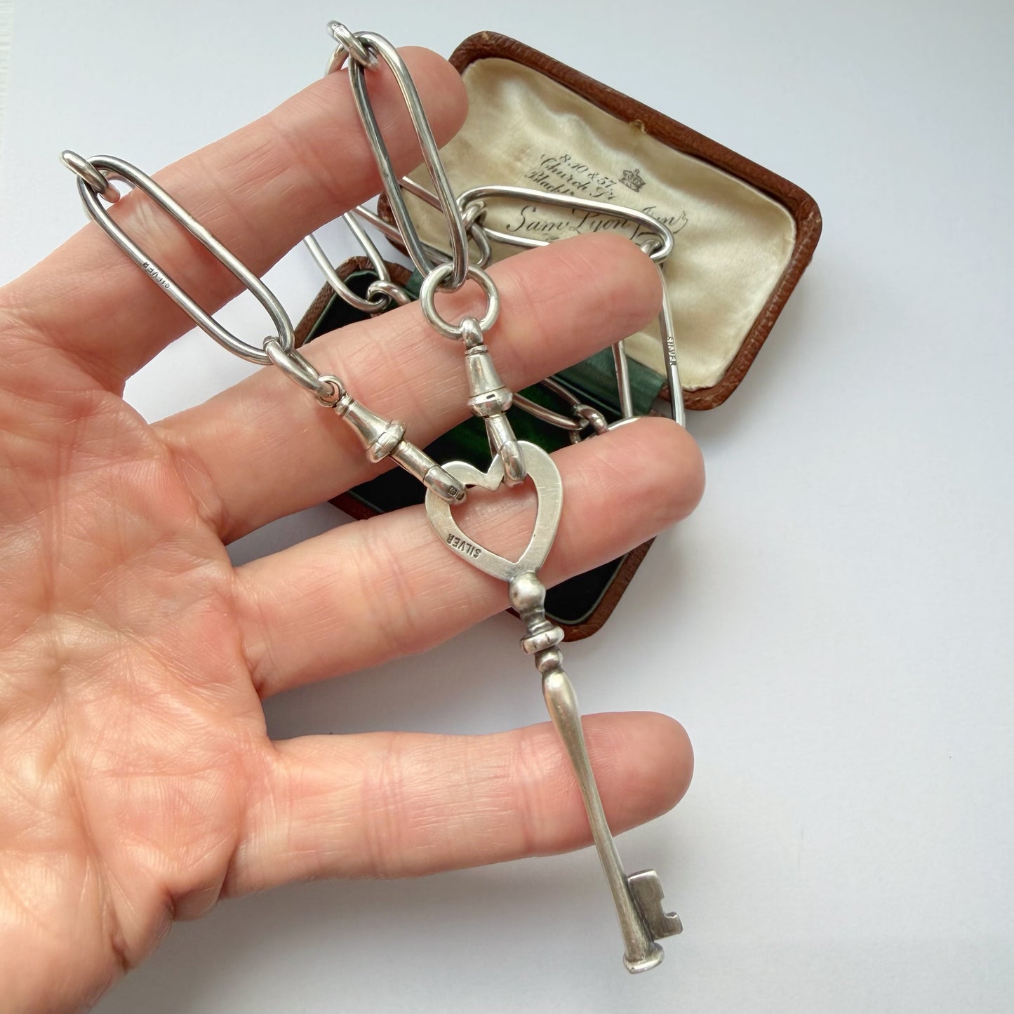 Vintage silver heart key pendant