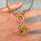 Antique 15ct gold, peridot & garnet spider pendant