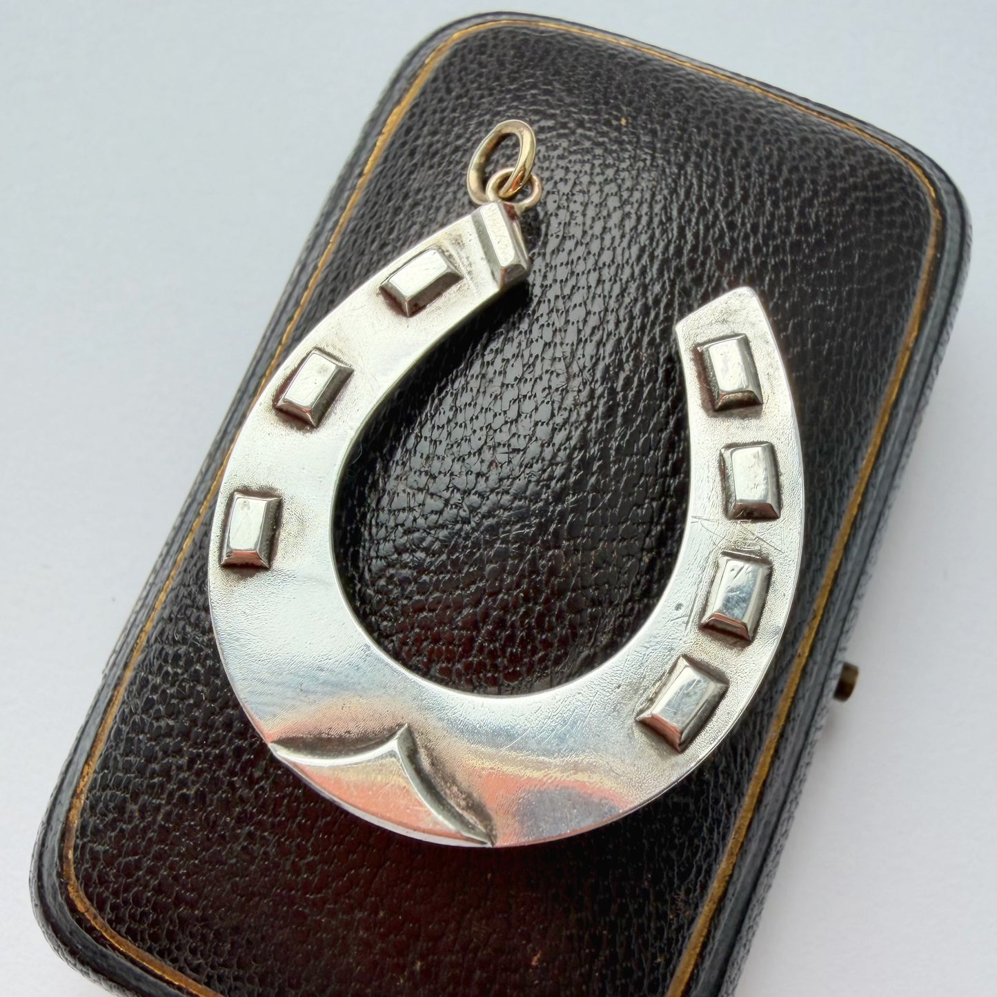 Victorian sterling silver & 9ct gold horseshoe pendant