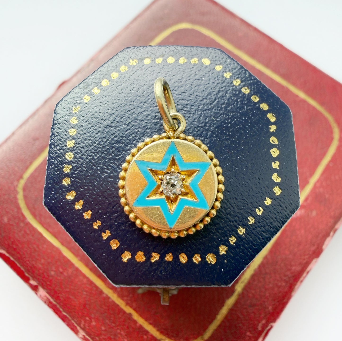 Antique 15ct gold, enamel and old mine cut diamond star charm