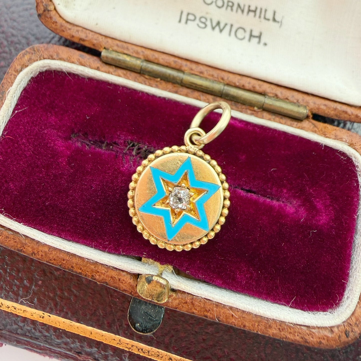 Antique 15ct gold, enamel and old mine cut diamond star charm