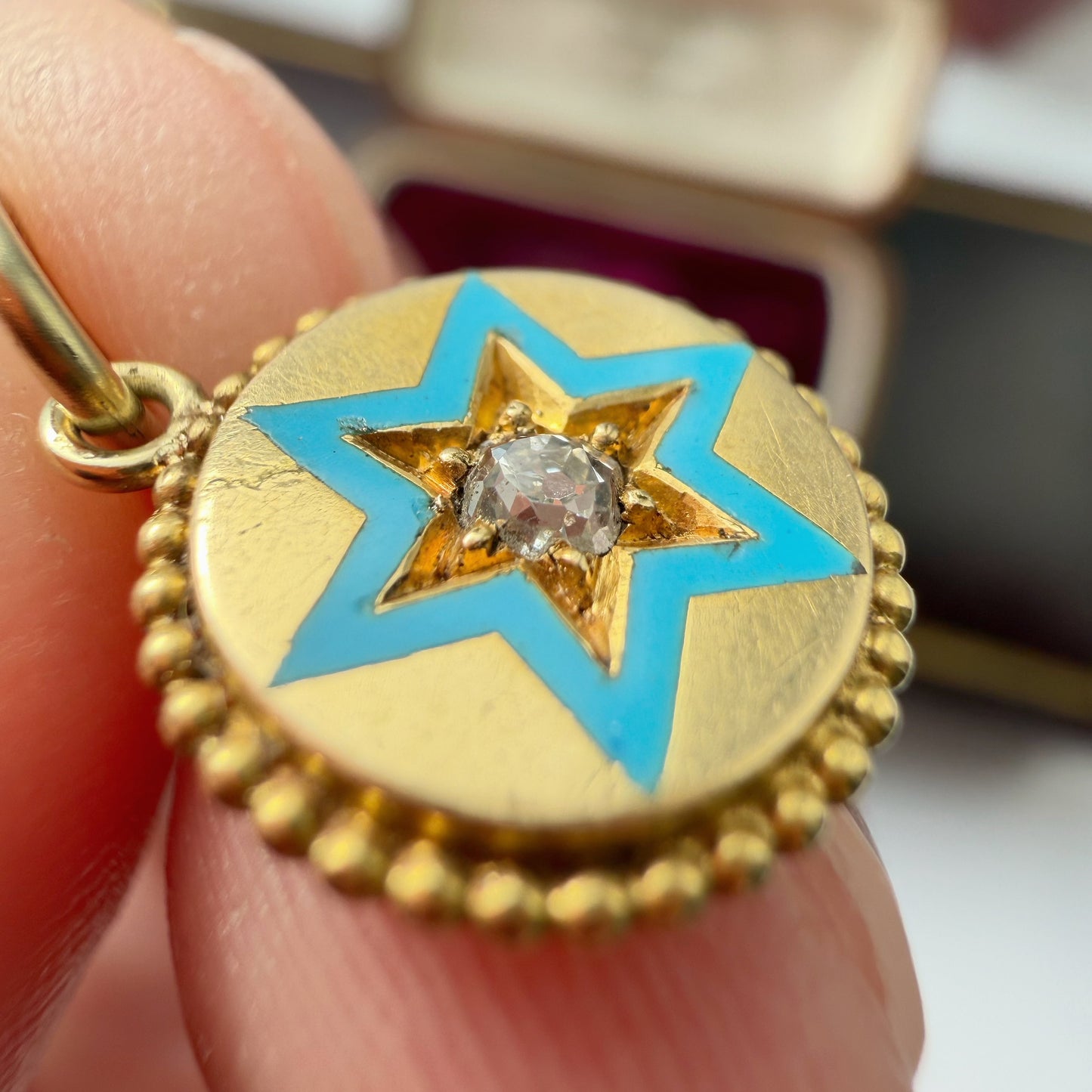 Antique 15ct gold, enamel and old mine cut diamond star charm