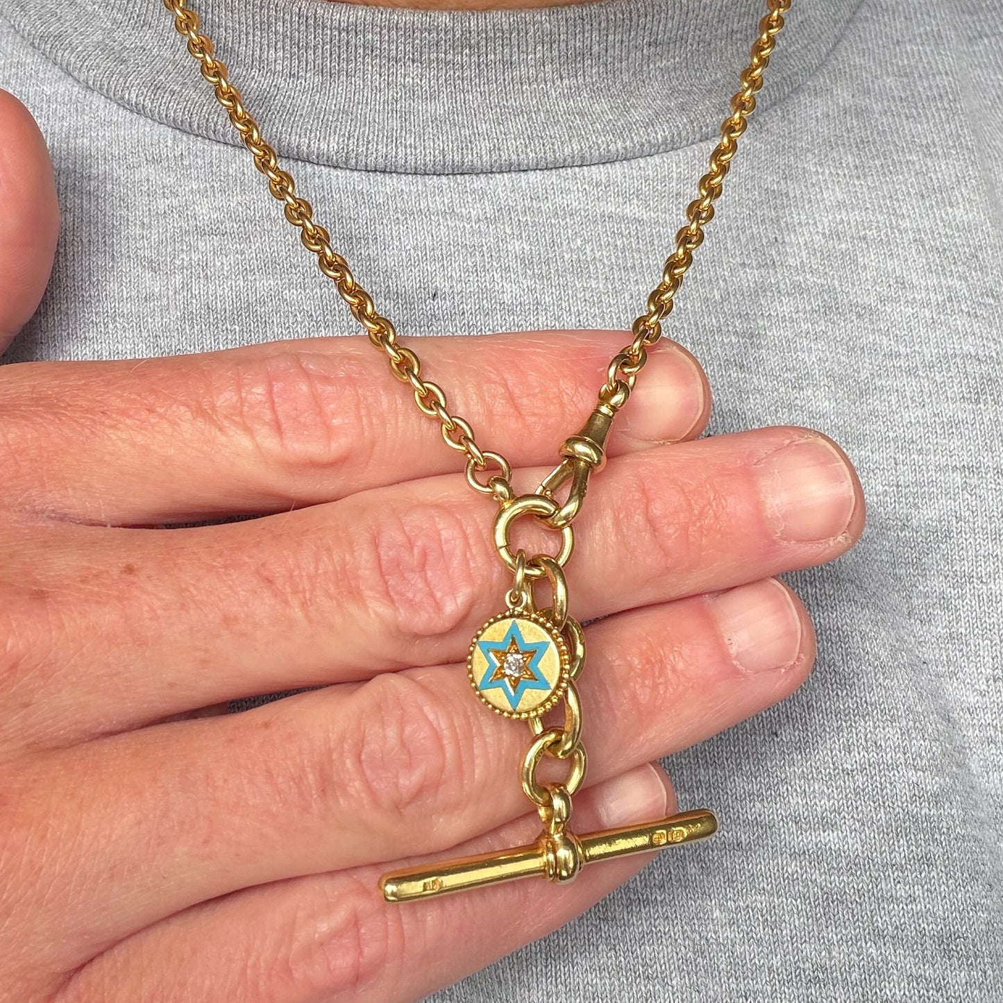 Antique 15ct gold, enamel and old mine cut diamond star charm