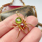 Antique 15ct gold, peridot & garnet spider pendant
