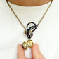 Art Deco silver gilt snake & heart locket necklace