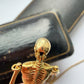 18ct gold skeleton necklace
