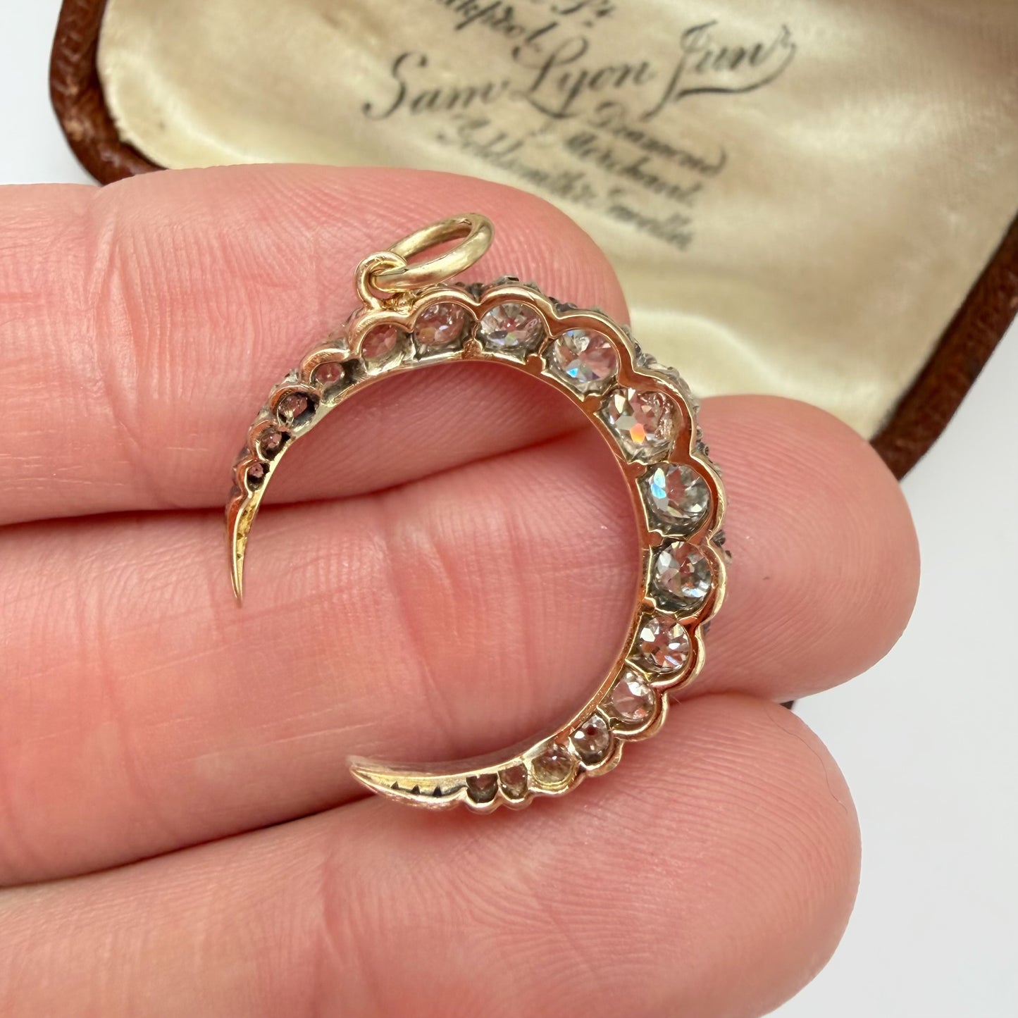 Antique 15ct gold, silver & old cut diamond crescent pendant