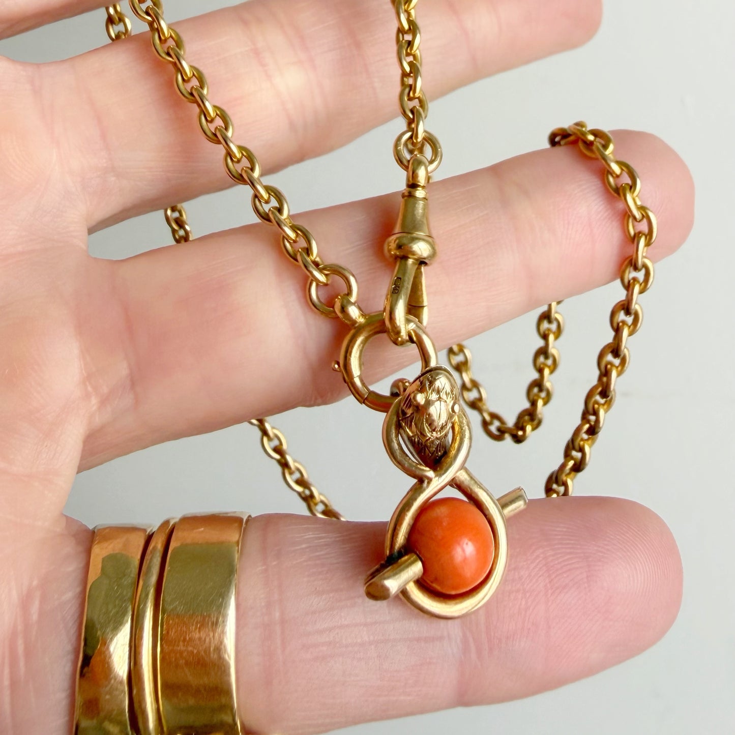 Victorian 15ct gold & coral snake charm