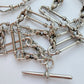 Antique silver trombone & lovers knot Albert chain