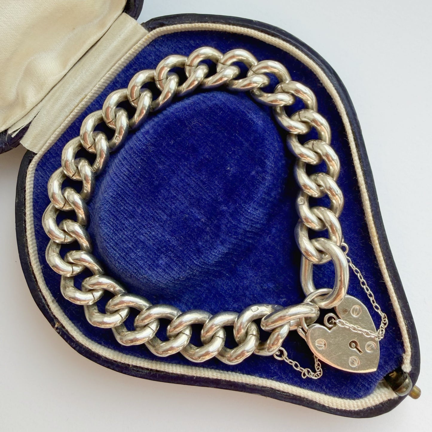 Vintage silver curb bracelet with heart padlock