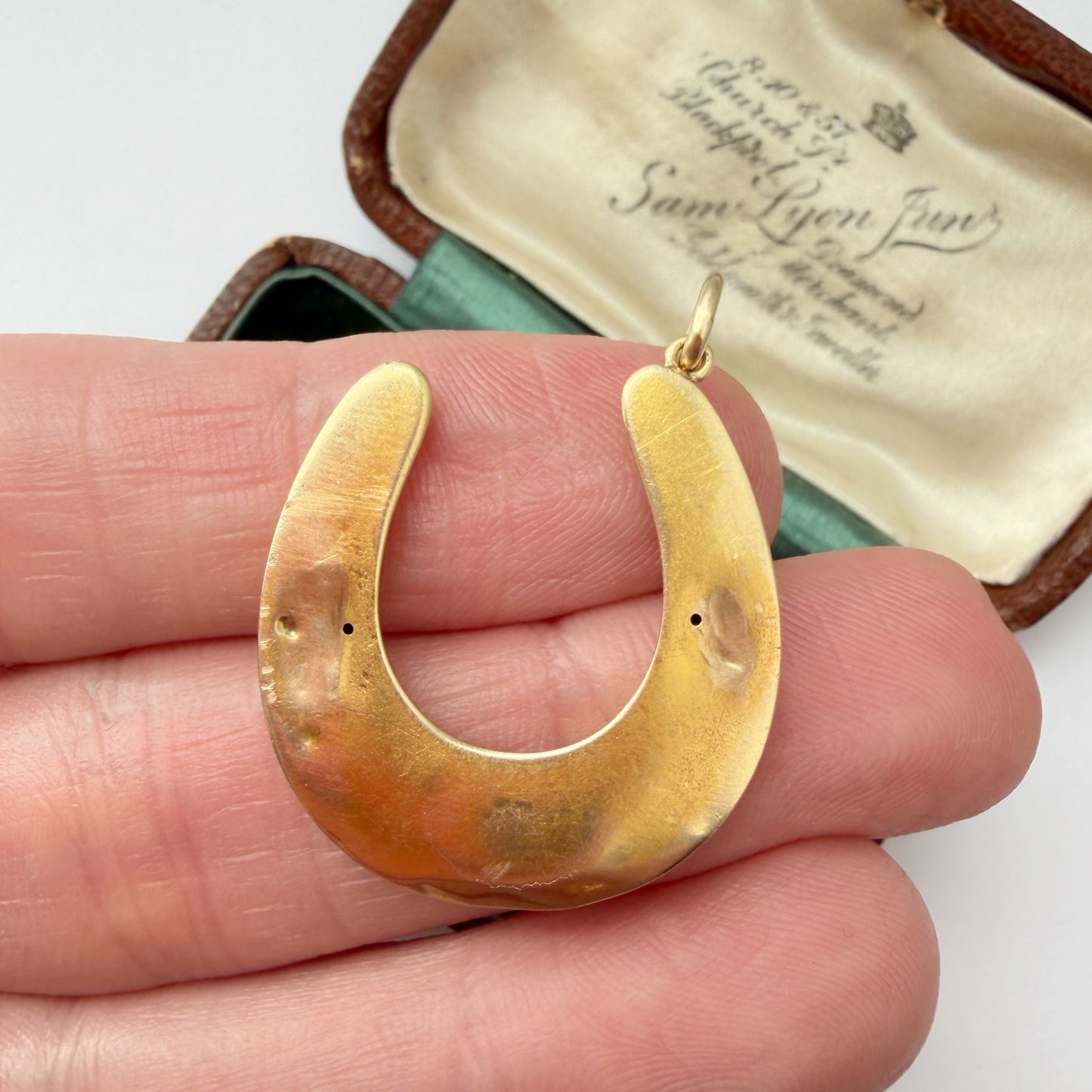 Antique 15ct gold & mixed gemstone horseshoe pendant