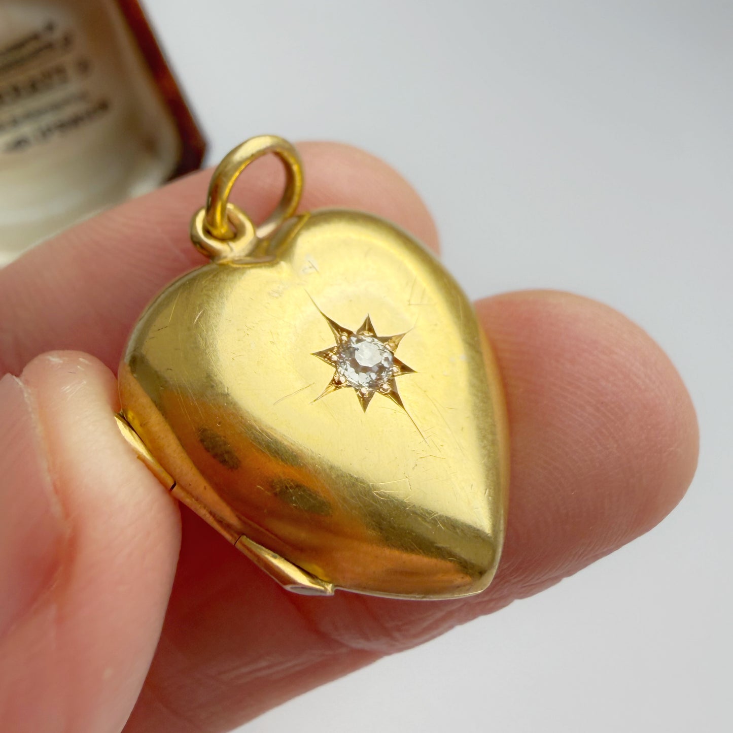 Edwardian 15ct gold & old mine cut diamond starburst heart locket