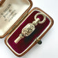 Antique 9ct gold watch key charm