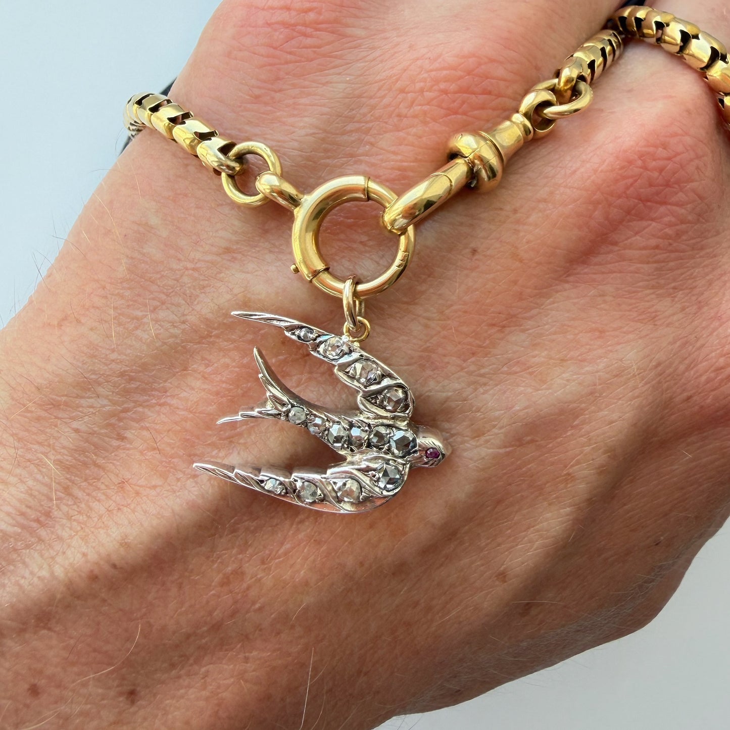 Antique gold, silver & rose cut diamond swallow charm