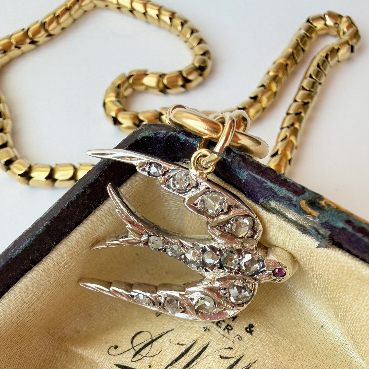 Antique gold, silver & rose cut diamond swallow charm