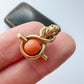 Victorian 15ct gold & coral snake charm