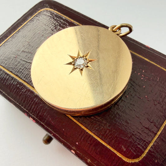 Antique 15ct gold & old cut starburst diamond locket