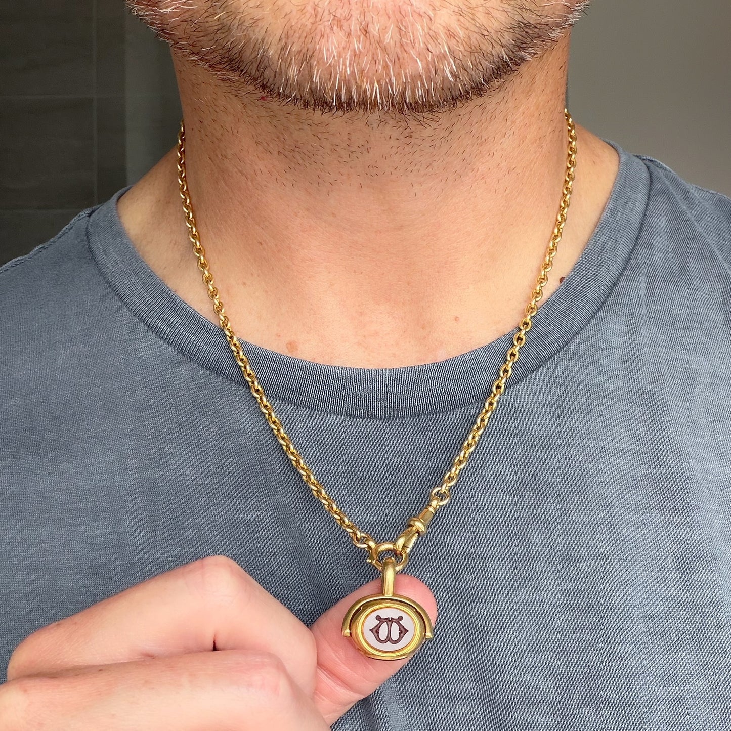 Antique 18ct gold triple stone spinning fob