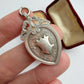 Antique sterling silver heart shaped fob