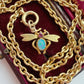 Antique 9ct/15ct, opal and ruby bug